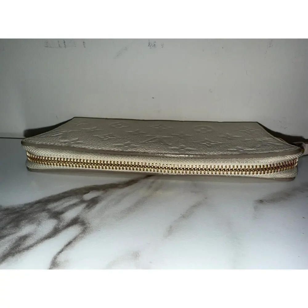 Louis Vuitton Zippy Wallet in Cream Empreinte Leather